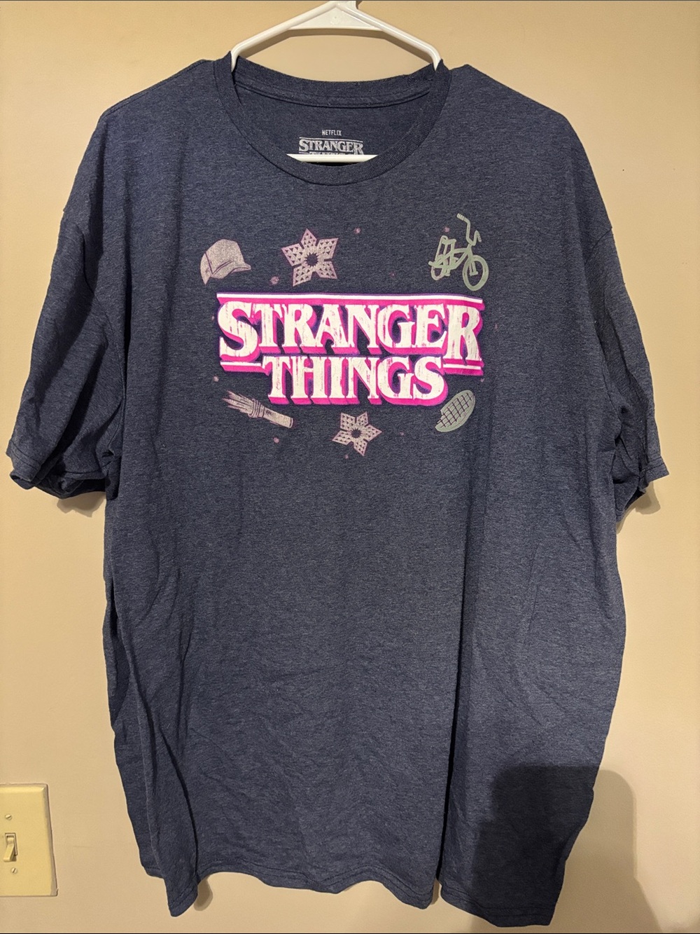 Short Sleeve Netflix Stranger Things TV Show Tee in Navy with Pink Logo